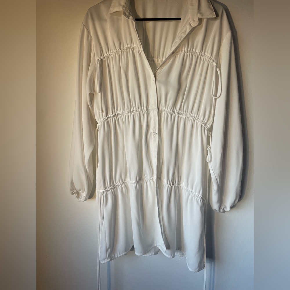 White mini dress with drawstring, long sleeves,